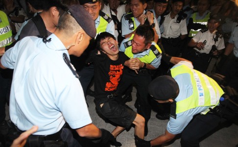 Joshua Wong Chi-fung arrested by police in the Government HQ on September 26, 2014.