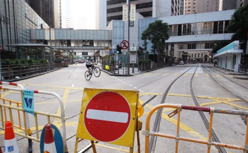 Streets remained clear of traffic - bar the odd bicycle - on Tuesday morning. Photo: Dickson Lee