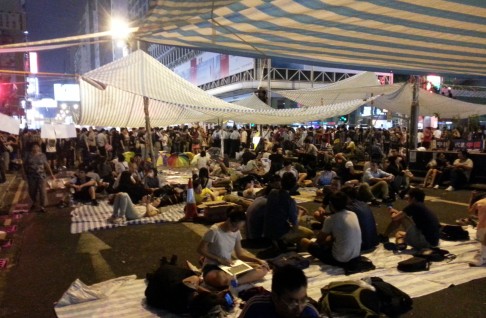 Students hold mini-forums or rest at the 'peaceful and relaxed' protest base in Mong Kok. Photo: Danny Mok