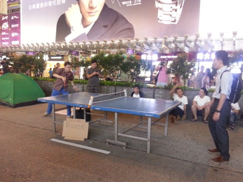 Protesters enjoy a game of table tennis in Mong Kok. Photo: Thomas Chan