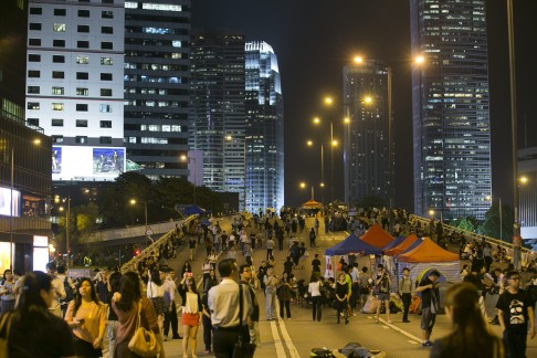 A main road remains blocked off with tents set up by pro-democracy advocates. Photo: EPA