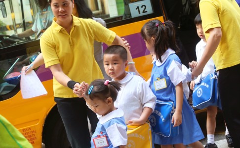 Preschoolers head to school, some 40 minutes late because of traffic disruptions. Photo: David Wong