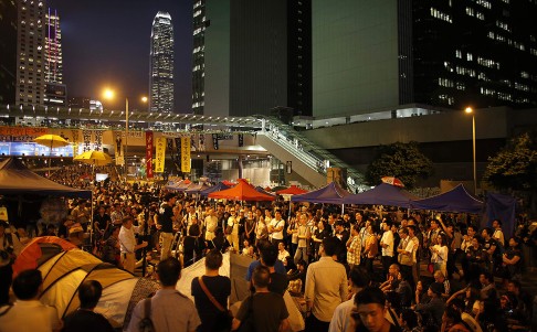 Protesters listen to speeches at the rally in Admiralty. Photo: Reuters