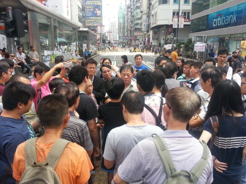 People gather for a political discussion in Mong Kok. Topics include the future of Occupy, communism and democracy. Photo: Timmy Sung