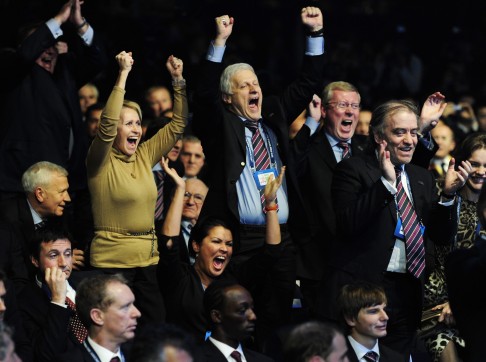 Russian delegation members celebrate after their country was announced as host for the Fifa 2018 World Cup.
Photo: AP