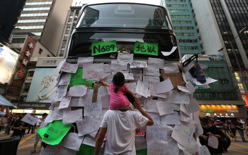 Day three: Protesters occupy a busy junction in Mong Kok, bringing traffic to a standstill.