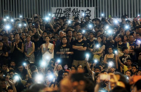 Day seven: The protest site in Admiralty is crowded with people and flashlights as protesters dig in their heels.