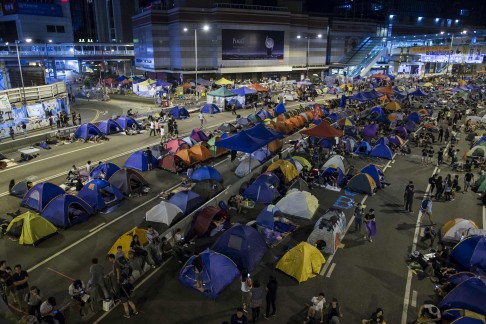Occupy Central movement protesters sleep in tents in Admiralty in the ealy hours of Sunday. Photo: Reuters
