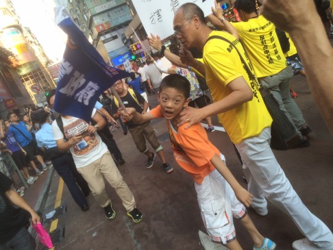 Protesters join an anti-Occupy march. Photo: Ernest Kao