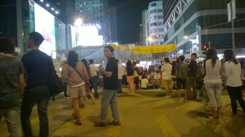 The tent that forms the centre of Mong Kok's occupied area is a site of heated debates. Photo: Patrick Boehler