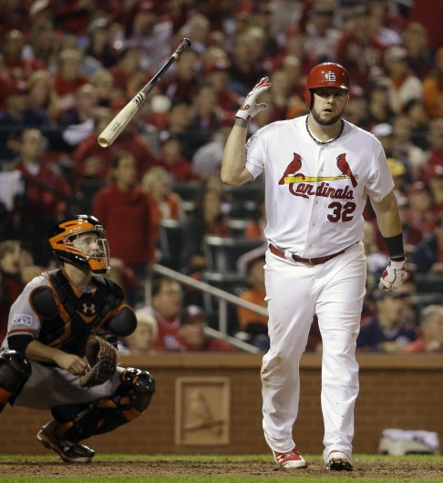St Louis' Matt Adams sets off after hitting a home run in the eighth inning in game two of the NL finals against the Giants.