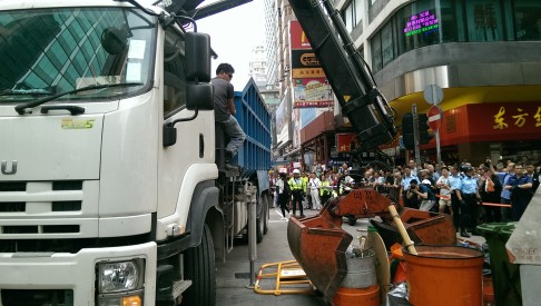 Barricades were torn down. Photo: Chris Lau