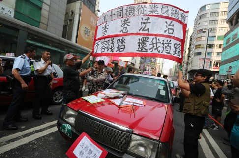 Taxi drivers complained that the protests have affected their livelihoods. Photo: Felix Wong