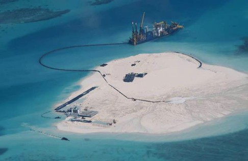 A photo dated February 25, 2014 photo shows ongoing Chinese land reclamation at Johnson South Reef in the South China Sea, known to China as Chigua Reef. Photo: AP