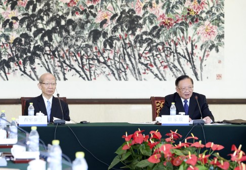 Tang Jiaxuan (right), the top Chinese member of the Fifth 21st Century Committee for China-Japan Friendship, attends the plenary session of the committee with his Japanese counterpart Taizo Nishimuro in Beijing. Photo: Xinhua