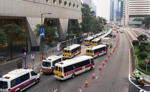 A show of force this morning as numerous police vans headed to the Occupy site in Admiralty. Photo: K. Y. Cheng