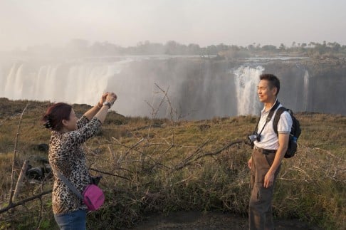A photo op at Victoria Falls. Picture: AFP