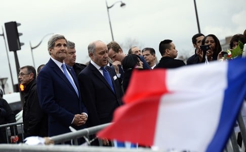 John Kerry and French Foreign Affairs minister Laurent Fabius pay tribute to the victims  of the shootings at a Jewish supermarket in Porte de Vincennes. Photo: AFP