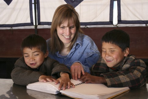 Sabriye Tenberken, who lost her sight as a child, with students at the school for the blind she founded in Lhasa, Tibet.