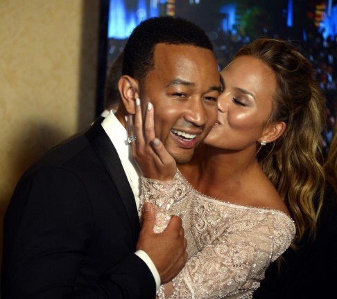 Wife Chrissy Teigen and Legend after his Golden Globe win.