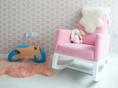 The soothing wallpaper used in the baby room is designed by Karim Rashid.