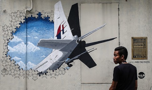 malaysia_missing_plane_anniversary_kul106_48760047.jpg