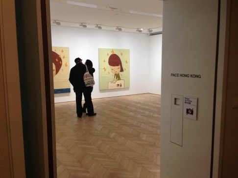 Visitors view artworks by Japan’s Yoshitomo Nara at the Pace Hong Kong gallery in Central.
