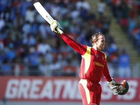 Zimbabwe's Brendan Taylor celebrates scoring a century  against India, but they eventually fall to India. Photo:  Reuters 