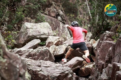 A competitor negotiates a rock scrambling section during the Bonaqua Action Sprint organised by Action Asia Events on March 8, 2015 in Sai Kung. Photo: Action Asia Events