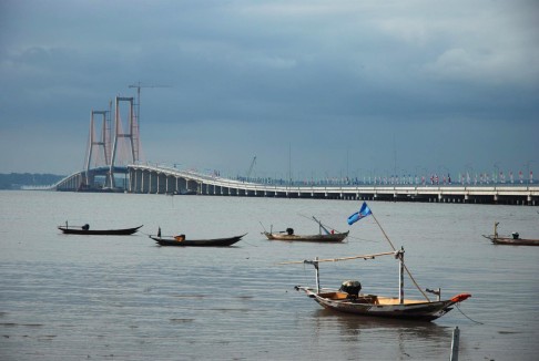 Joko Widodo says projects, such as the Suramadu bridge in Indonesia, can smooth relations in the region. Photo: AFP