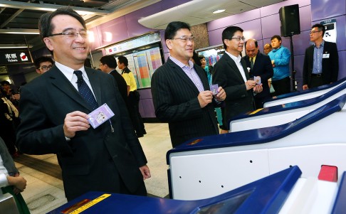 Operation Director Jacob Kam (left) attends the MTR Sai Ying Pun Station opening ceremony. Photo: David Wong