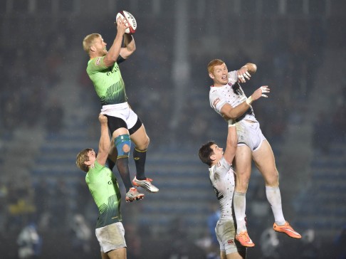 South Africa's Kyle Brown (left) and England's James Rodwell (right) get up for the line-out ball in the Cup final.
