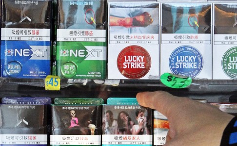 Warnings on cigarette packets in Hong Kong. Photo: SCMP