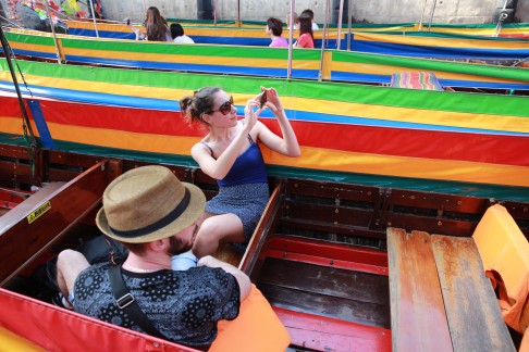 Tourists aboard a long-tail.