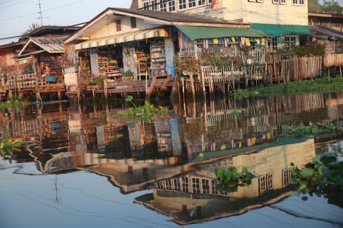 Stilt homes and stores on aklongthat flows into Bangkok's Chao Phraya river.