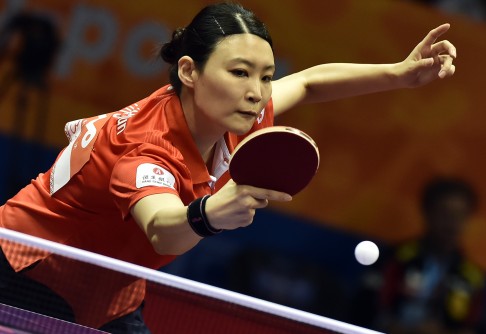 Hong Kong's Jiang Huajun was stretched to seven games in her opening singles game. 