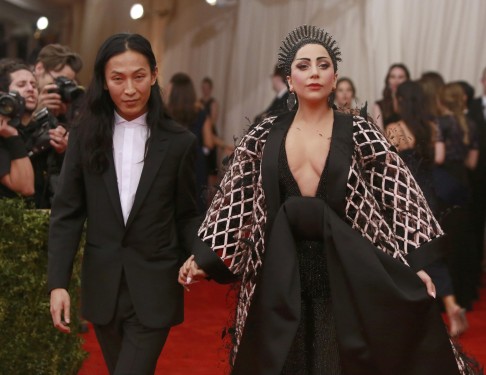 Lady Gaga is seen arriving at the gala with American fashion designer Wang. Photo: Reuters