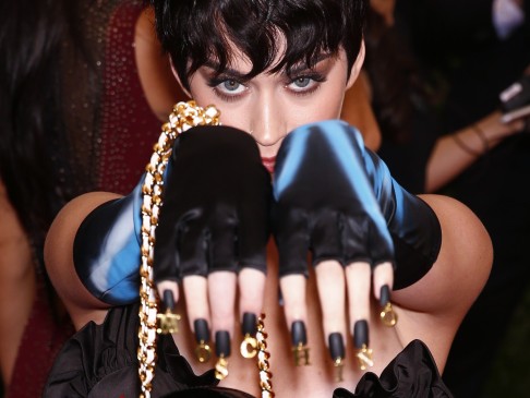 Nailed it? Katy Perry shows off her "China-themed" Moschino manicure. Photo: Reuters