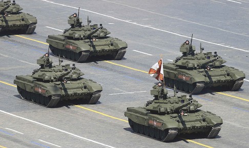 Russian servicemen drive T-90A tanks during the parade. Reuters