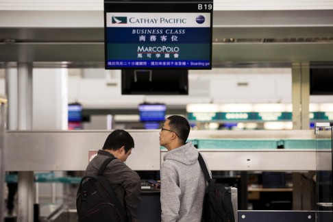 Checking in business class at Chek Lap Kok. Photo: Bloomberg