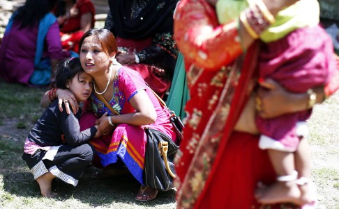 Frightened Kathmandu residents take refuge in opens spaces during the quake. Photo: EPA