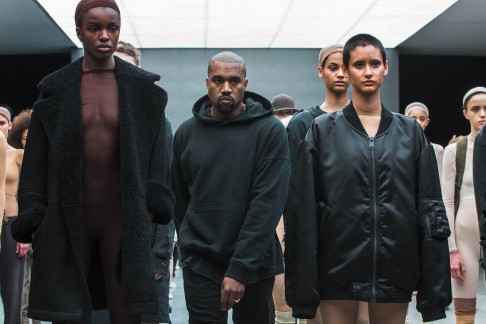 Kanye West with models presenting his autumn/winter 2015 partnership line with Adidas. Bieber takes inspiration from West's fashion success.