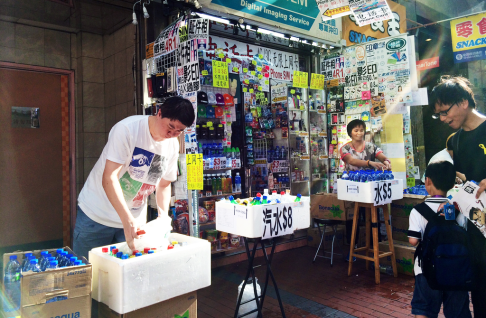 Fan Bill says turnout is low, but his water stall is still doing brisk trade. Photo: Gloria Chan