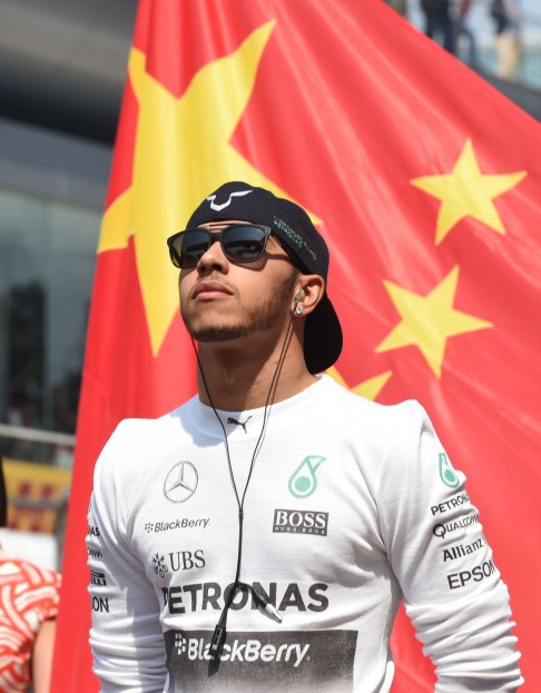 This year's winner Lewis Hamilton gets ready for the start of the Formula One Chinese Grand Prix in Shanghai in April. The Englishman led a 1-2 finish for Mercedes. The city has hosted the race since 2004. Photo: AFP </p>
<p> 