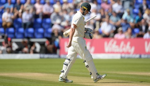 Shane Watson trudges off after being dismissed. Photo: Reuters