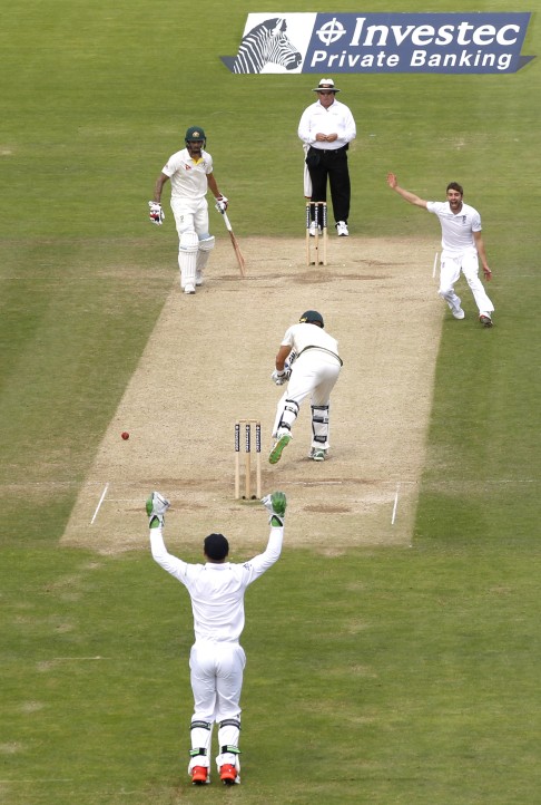 Mark Wood celebrates taking Shane Watson's wicket. Photo: Reuters