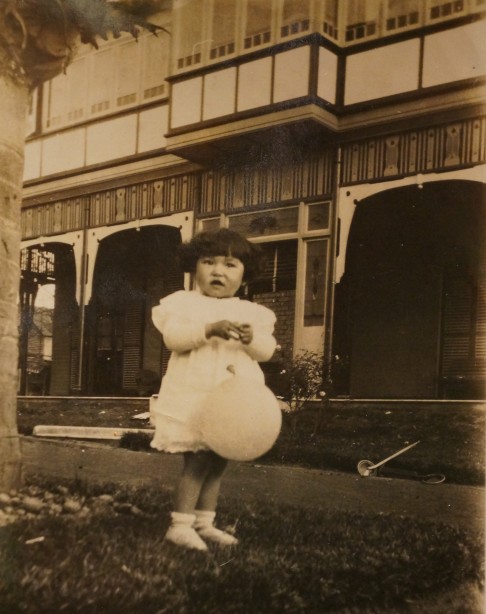 The author's mother in 1935 in front of Milton House, the four-acre Sydney estate where her parents once lived. Whatever happened to the grand fortune of which the mansion was a part? Photo: Ian Young