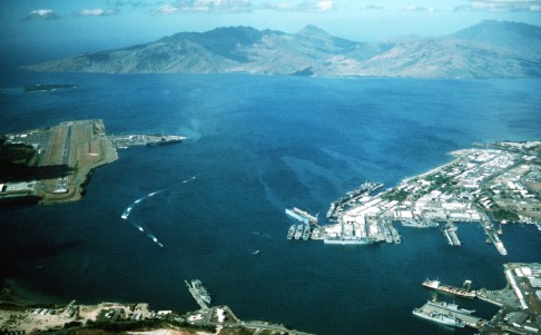 An aerial view of Naval Station Subic Bay (right) and Naval Air Station Cubi Point (left).
