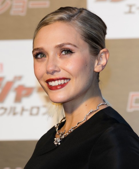 Elizabeth Olsen joins Mary-Kate and Ashley for launch of new handbag line -  but will anyone buy their $39,000 backpack?