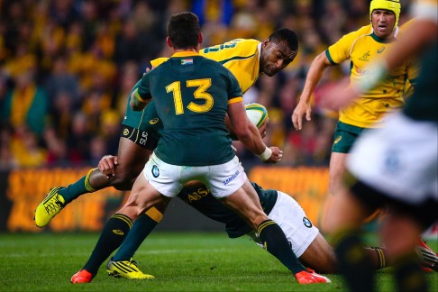 Australia's Tevita Kuridrani, scorer of the match-winning last-minute try, is tackled by Jesse Kriel of South Africa during their Rugby Championship clash in Brisbane on Saturday. Photo: AFP